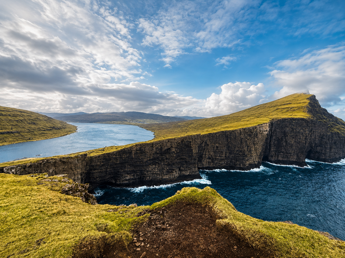 Boat tour across Leitisvatn toward the Lake Above the Ocean